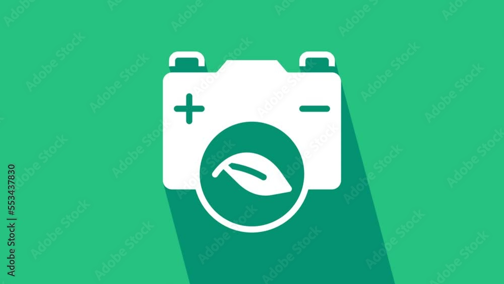 White Eco nature leaf and battery icon isolated on green background. Energy based on ecology saving concept. 4K Video motion graphic animation White Eco nature leaf and battery icon isolated on green background. Energy based on ecology saving concept. 4K Video motion graphic animation