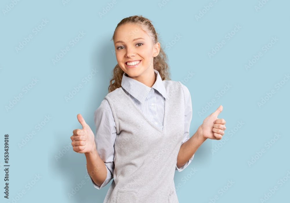 Young happy woman show a finger Young happy woman show a finger