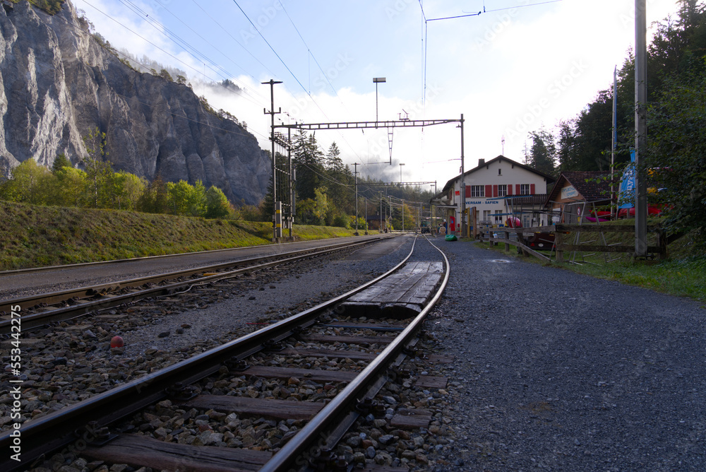 Railway station Versam-Safien, Canton Graubünden, on a blue cloudy autumn morning. Photo taken September 26th, 2022, Versam-Safien, Switzerland.