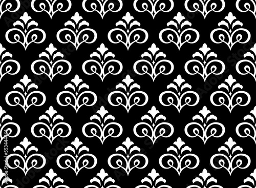 Wallpaper in the style of Baroque. Seamless vector background. White and black floral ornament. Graphic pattern for fabric, wallpaper, packaging. Ornate Damask flower ornament