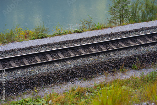 Famous gorge at Anterior Rhine Valley at Versam, Canton Graubünden, with railway track and Rhine River on a sunny autumn morning. Photo taken September 26th, 2022, Versam, Switzerland. photo