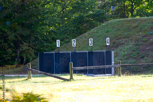 Scenic view of shooting range in the woods at mountain village Versam. Canton Graubünden, on a sunny autumn morning. Photo taken September 26th, 2022, Versam, Switzerland. photo