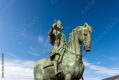 Bronze statue of King Philip III on Horseback (Felipe III or Felipe el Piadoso), by Giambologna and Pietro Tacca in Plaza Mayor (main square), Madrid downtown, Spain, southern Europe. photo