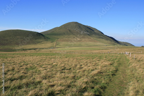 mountains (col de la croix saint-robert) and prairies in auvergne (france)