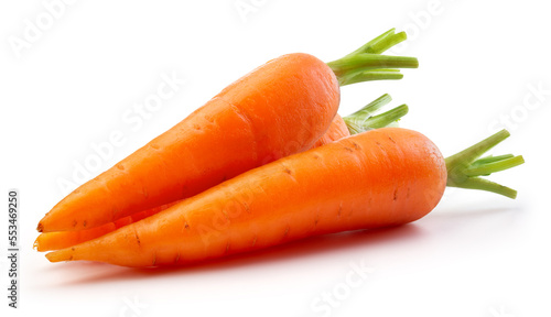 Carrots isolated. Carrot on white background. Carrots with green leaves.