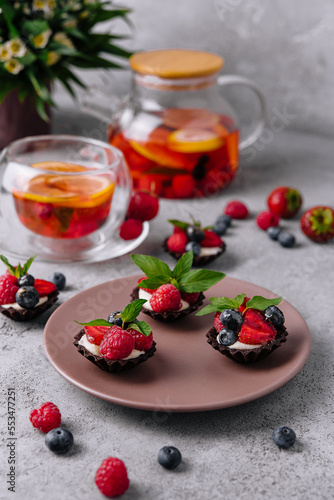 Chocolate ganache tarts with fresh berries