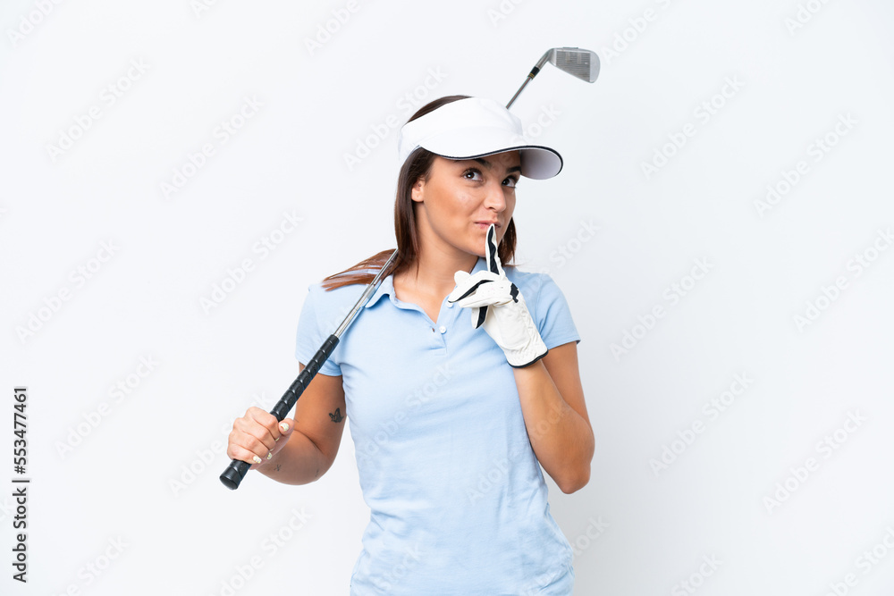 Young caucasian woman playing golf isolated on white background having doubts while looking up Young caucasian woman playing golf isolated on white background having doubts while looking up