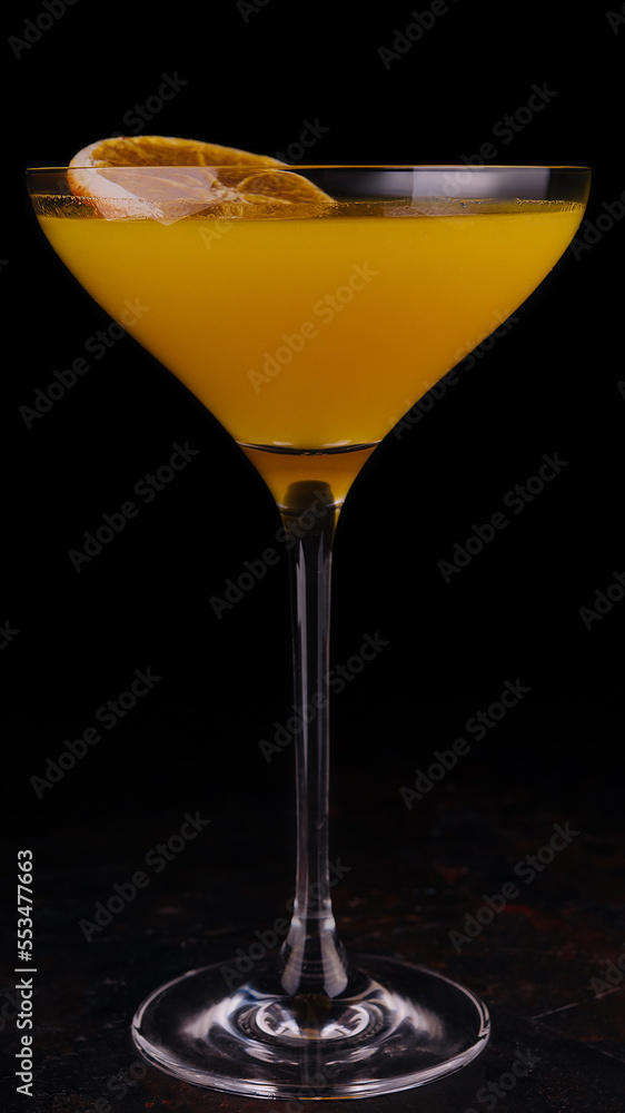 Orange martini or Margarita cocktail on black Orange martini or Margarita cocktail on black