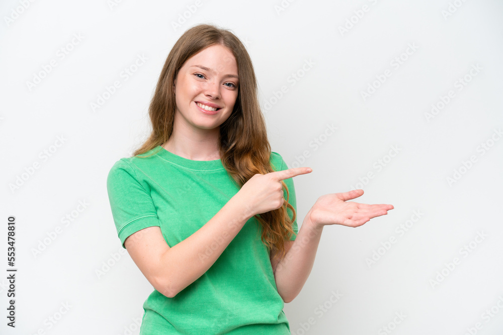Young pretty woman isolated on white background holding copyspace imaginary on the palm to insert an ad Young pretty woman isolated on white background holding copyspace imaginary on the palm to insert an ad