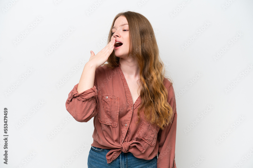 Young pretty woman isolated on white background yawning and covering wide open mouth with hand Young pretty woman isolated on white background yawning and covering wide open mouth with hand
