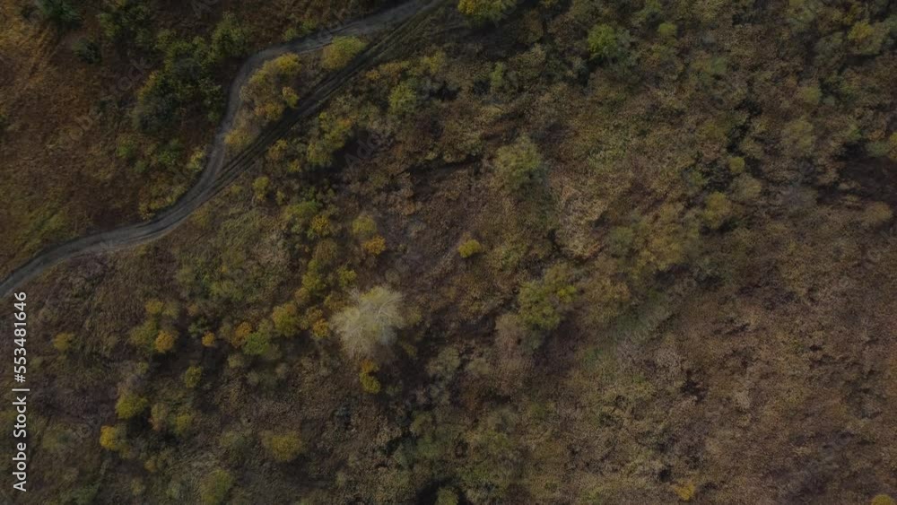 Flying over the field with the camera down Flying over the field with the camera down