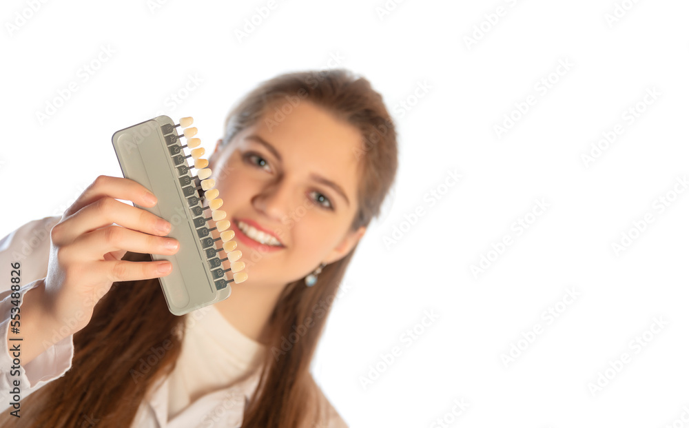 Portrait of young attractive dentist laboratory technician posing