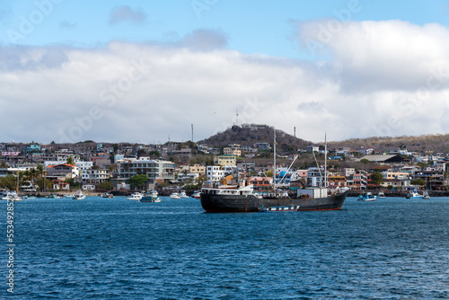 Harbor with ships and cityscape of Puerto Baquerizo Moreno, Galapagos national park, Ecuador.