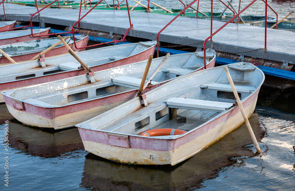 several old boats near the pier