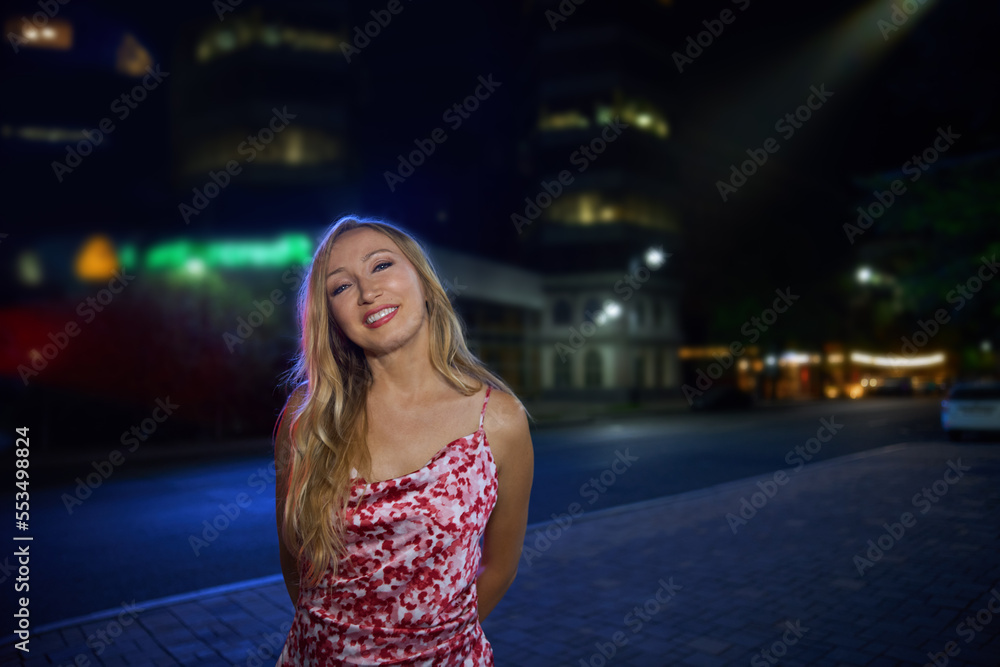 Cheerful young woman looking at camera on the street Cheerful young woman looking at camera on the street