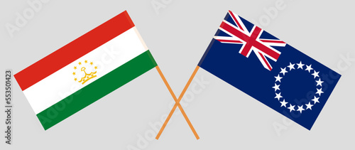 Crossed flags of Tajikistan and Cook Islands. Official colors. Correct proportion