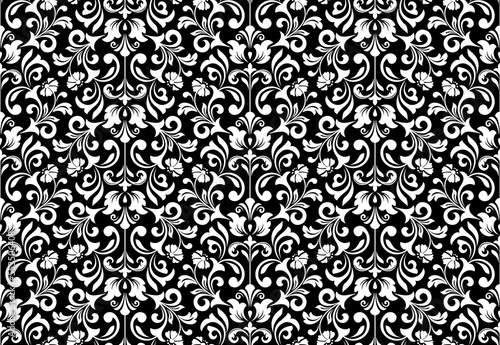 Wallpaper in the style of Baroque. Seamless vector background. White and black floral ornament. Graphic pattern for fabric, wallpaper, packaging. Ornate Damask flower ornament