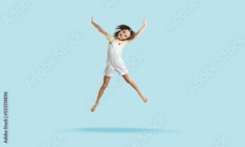 Wallpaper Mural Energetic cute child jumping and posing Torontodigital.ca