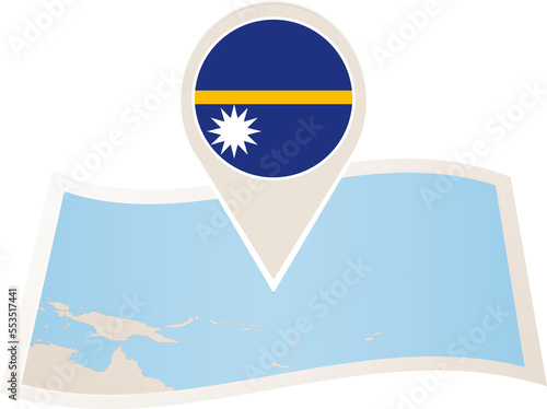 Folded paper map of Nauru with flag pin of Nauru.