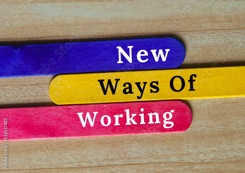 New ways of working text on colorful wooden sticks - Ways of working concept. photo