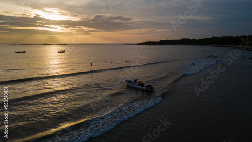 Beautiful aerial view of a sunset in the beach of Tamarindo Costa Rica in Guanacaste