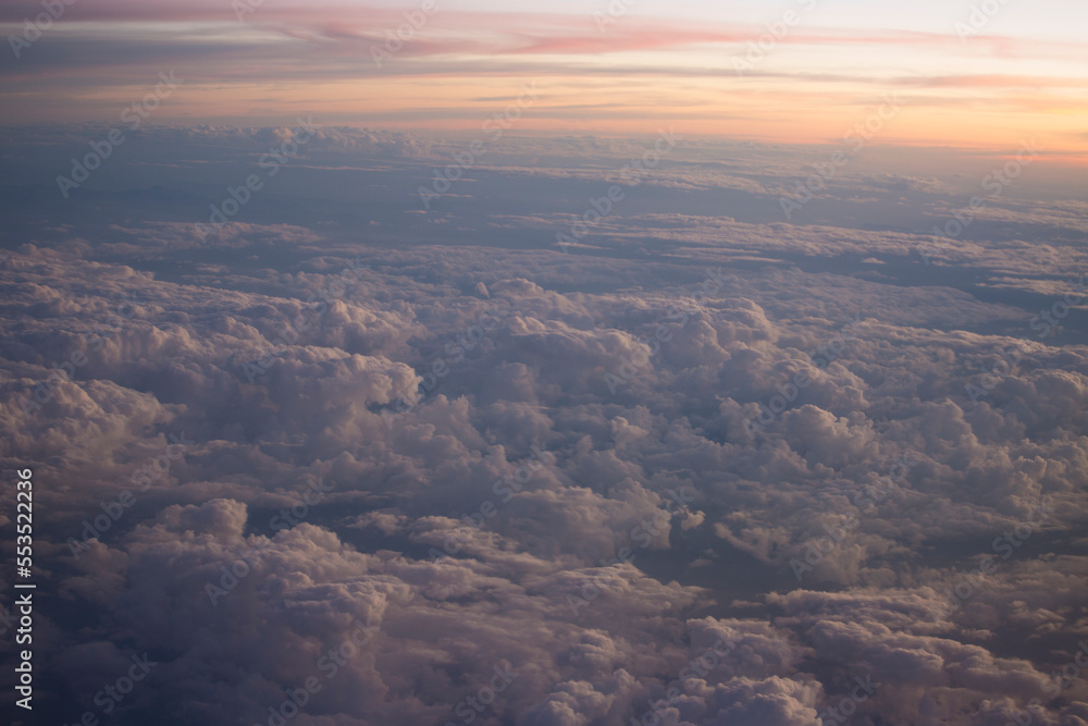 Aerial View of Cloud and Sky from Airplane's window