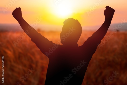 Young person walking on big field