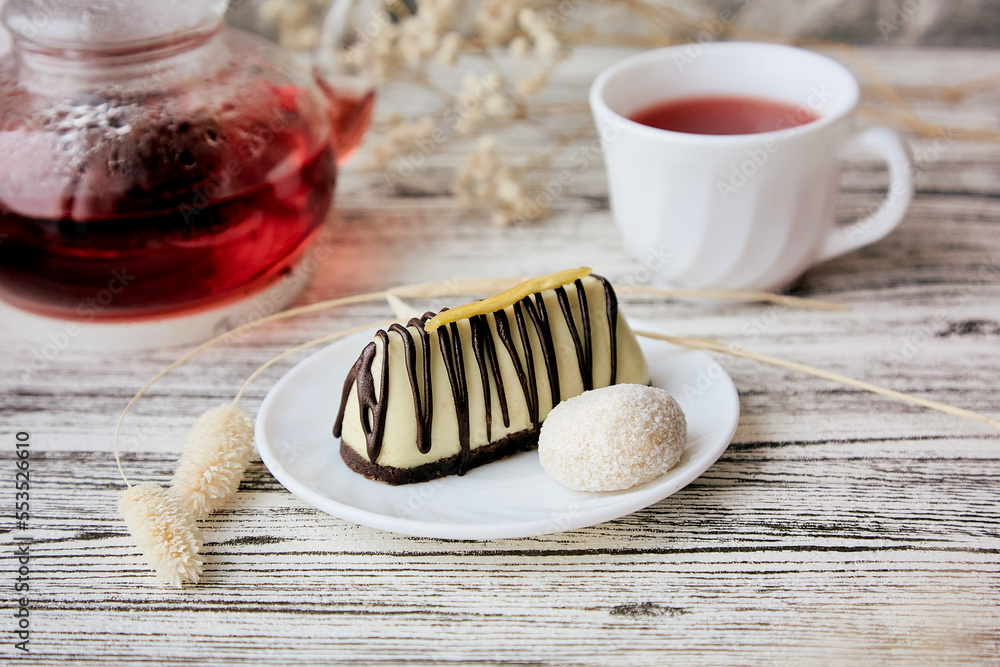 Tasty vegan with no sugar, gluten free mango cake. Natural organic tea. Healthy aesthetic breakfast Tasty vegan with no sugar, gluten free mango cake. Natural organic tea. Healthy aesthetic breakfast