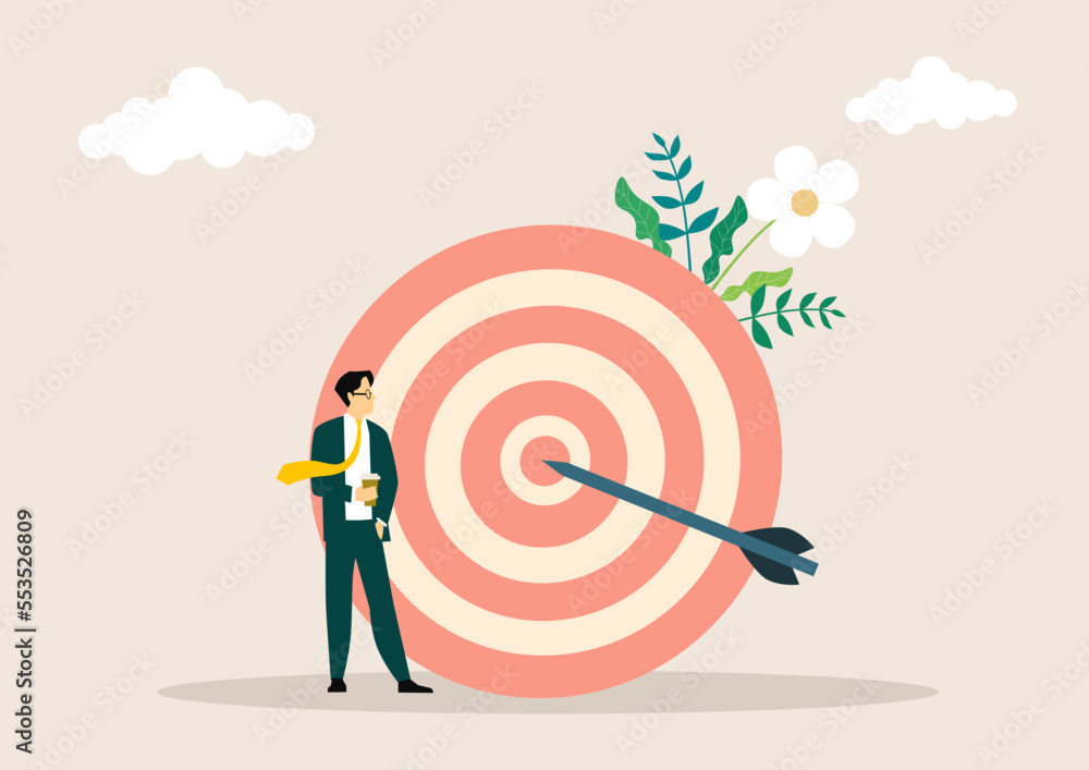 Purpose or target, goal and resolution to aim for success, aspiration and motivation to achieve goal concept, confident businessman stand with arrow hit bullseye on archery target. Purpose or target, goal and resolution to aim for success, aspiration and motivation to achieve goal concept, confident businessman stand with arrow hit bullseye on archery target.
