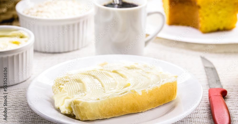 slice of salt bread cut with butter, called French bread in Brazil