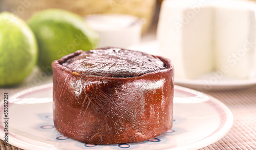 Brazilian guava paste, homemade guava paste, called goiabada smudge, traditional candy of the June or July festivities in Brazil, brazilian restaurant food photo