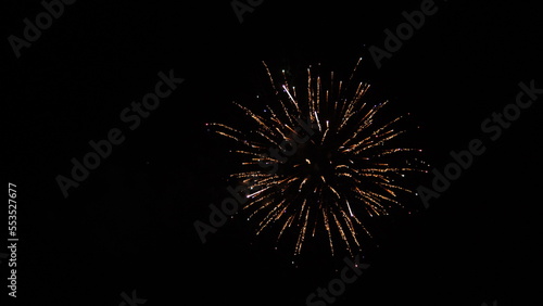 firework sky 2024. christmas. shining colorful golden firework sky. background glowing display new year. multicolor blur night. eve christmas. celebration fireworks. show real happy fortunate lights.