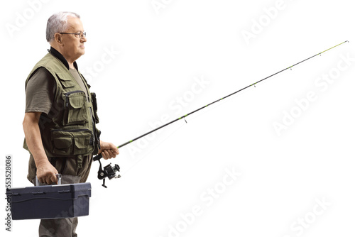 Elderly fisherman with a box and fishing rod