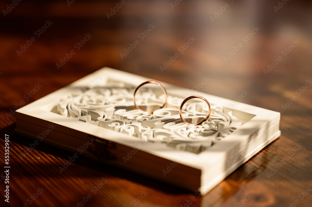 Gold rings of newlyweds, wedding accessories, rings close-up. Gold rings of newlyweds, wedding accessories, rings close-up.