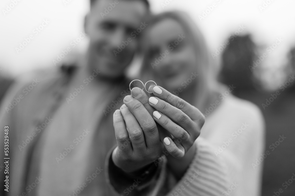 Picture of man and woman with wedding ring.Young married couple holding