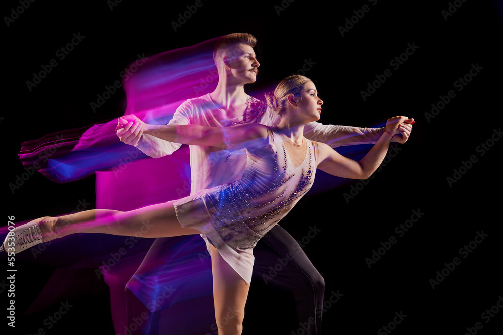 Ταπετσαρία Portrait of young man and woman, figure skating athletes dancing isolated over b