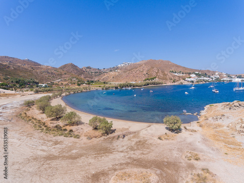 Aerial view of sailing boats in the natural harbor at Aegean Sea of Patmos island, Greece
