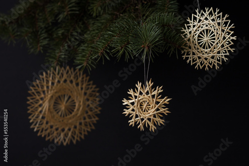 Snowflake are made of straw. Christmas decor. Small depth of field