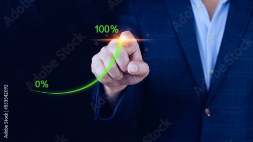 Businessman pointing touching to that has grown exponentially rapidly from 0 percent to 100 percent sales in short period of business success strategy and planning concept. photo