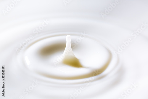 macro milk drop texture,milk or white liquid splash with circle ripple