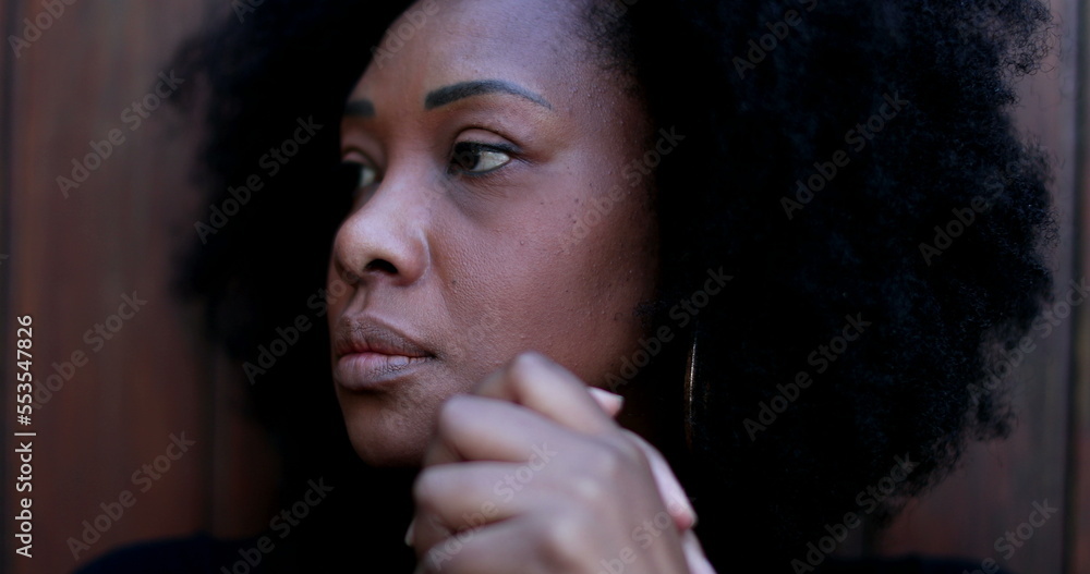 Anxious black woman overwhelmed with preoccupation Anxious black woman overwhelmed with preoccupation