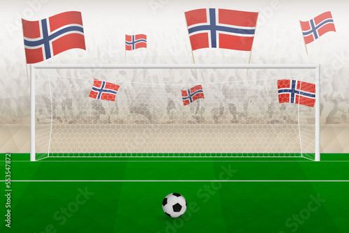 Norway football team fans with flags of Norway cheering on stadium, penalty kick concept in a soccer match.