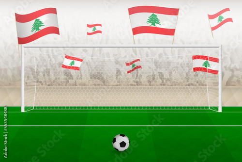 Lebanon football team fans with flags of Lebanon cheering on stadium  penalty kick concept in a soccer match.