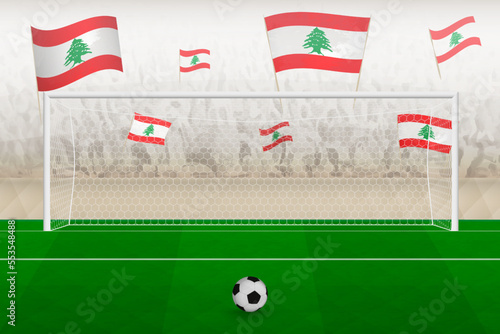 Lebanon football team fans with flags of Lebanon cheering on stadium, penalty kick concept in a soccer match.
