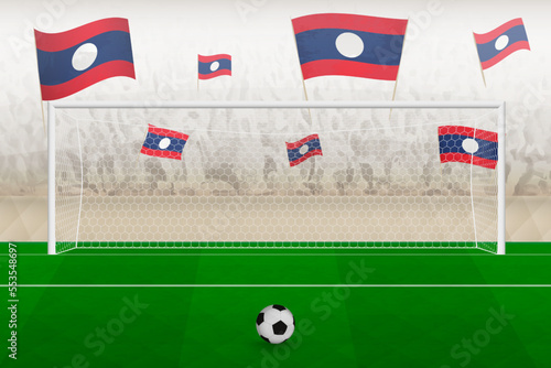 Laos football team fans with flags of Laos cheering on stadium, penalty kick concept in a soccer match.