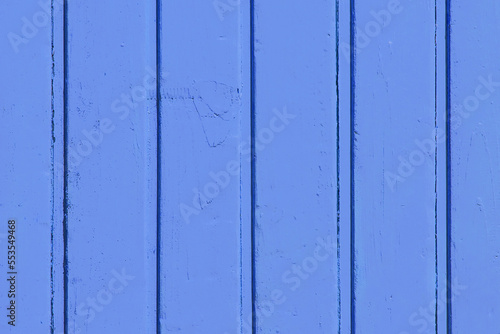 Vertical boards blue color paint wooden surface texture plank background