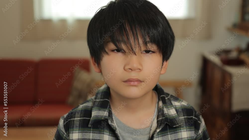 Asian teenage boy opens his eyes and stars the camera. Loneliness, Sadness, Emotionless. Dolly in. Asian teenage boy opens his eyes and stars the camera. Loneliness, Sadness, Emotionless. Dolly in.