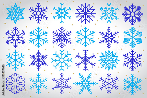 Copos de nieve en color azul para navidad o año nuevo con un fondo en degradado gris con estrellas doradas 