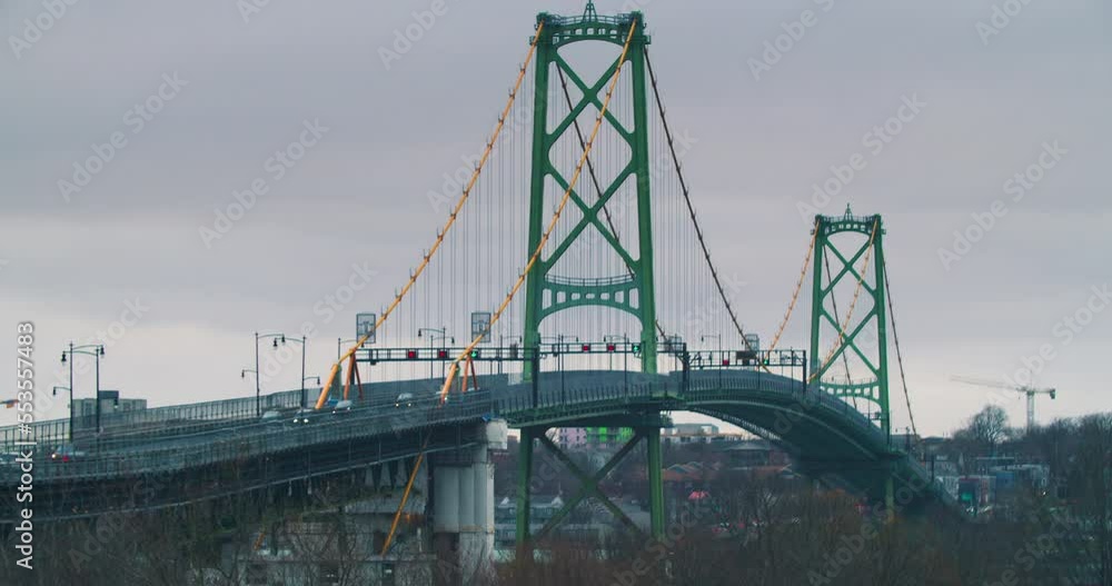 Angus L. McDonald Bridge (Halifax, Canada) Time lapse of the movement of cars on the bridge on a cloudy day. Angus L. McDonald Bridge (Halifax, Canada) Time lapse of the movement of cars on the bridge on a cloudy day.
