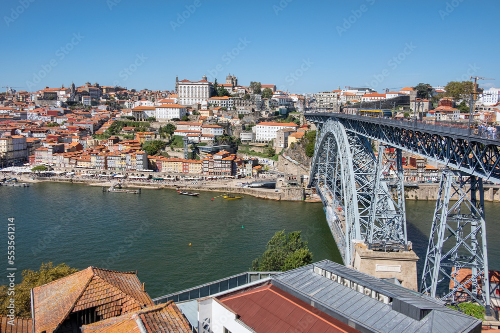 Views from Villa Nova de Gaya neighborhood towards the touristic Riberia district with its picturesque architecture, connected by Dom Luis I bridge on the right, in Porto, Portugal